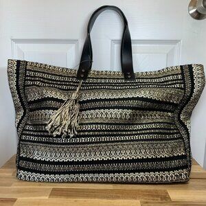 Artisan Woven Weekender Tote – Black & Gold Travel Bag with Tassels